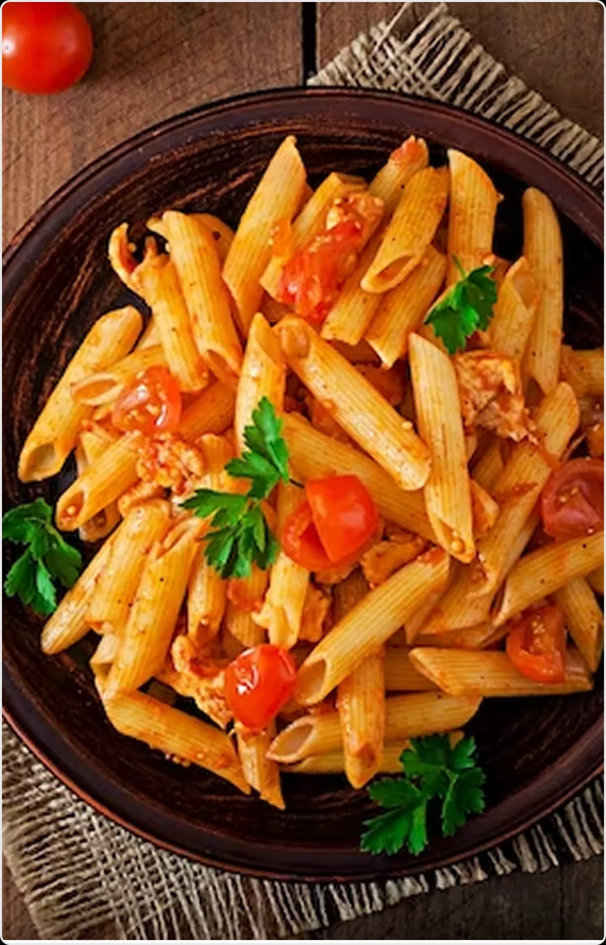 Fresh pasta with tomato and herbs